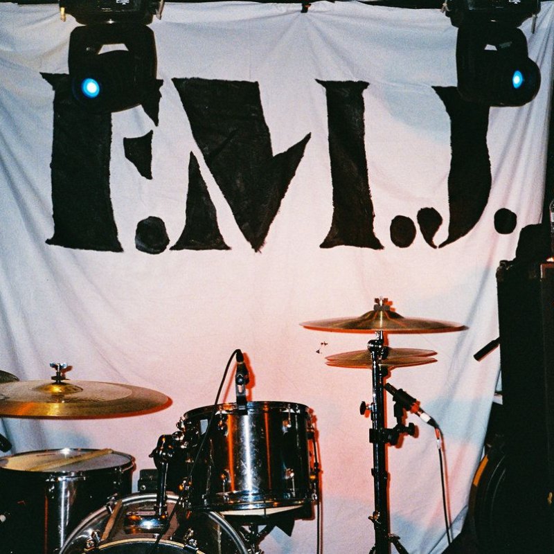 F.M.J.